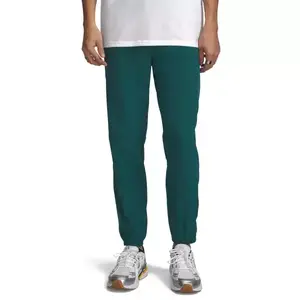 Under Armour VIBE WOVEN JOGGER Férfi melegítőnadrág, sötétzöld, méret kép