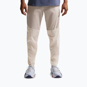 Férfi futónadrág Nike Stride Repel Woven cream li/birch/natural (Stride Repel Woven IF2020-236) kép