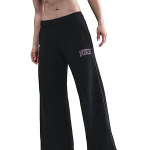 Női melegítőnadrágok NIKE W NSW PHNX FLC LOGO WIDE LEG BLACK kép